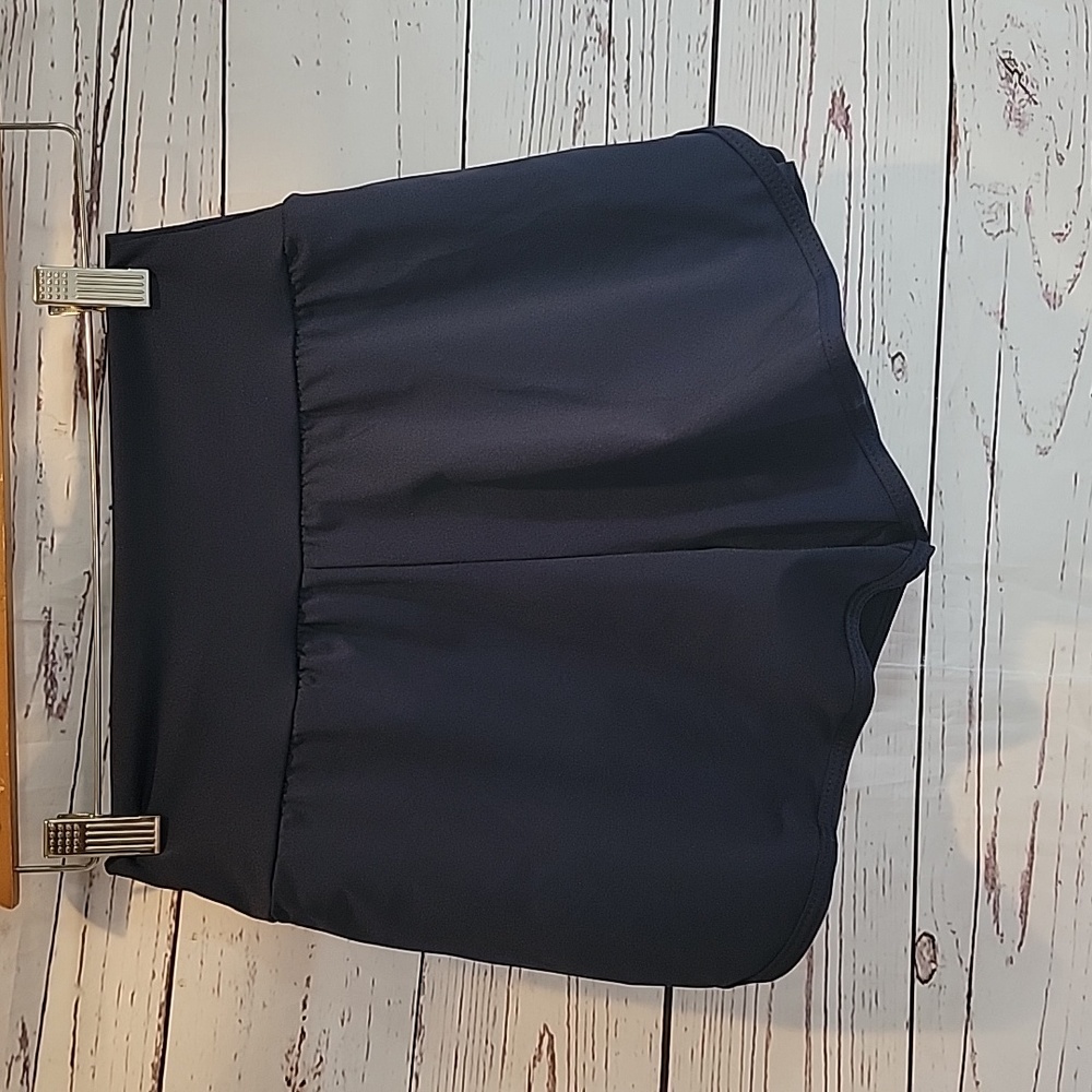 Athletic shorts with under shorts for modesty.
